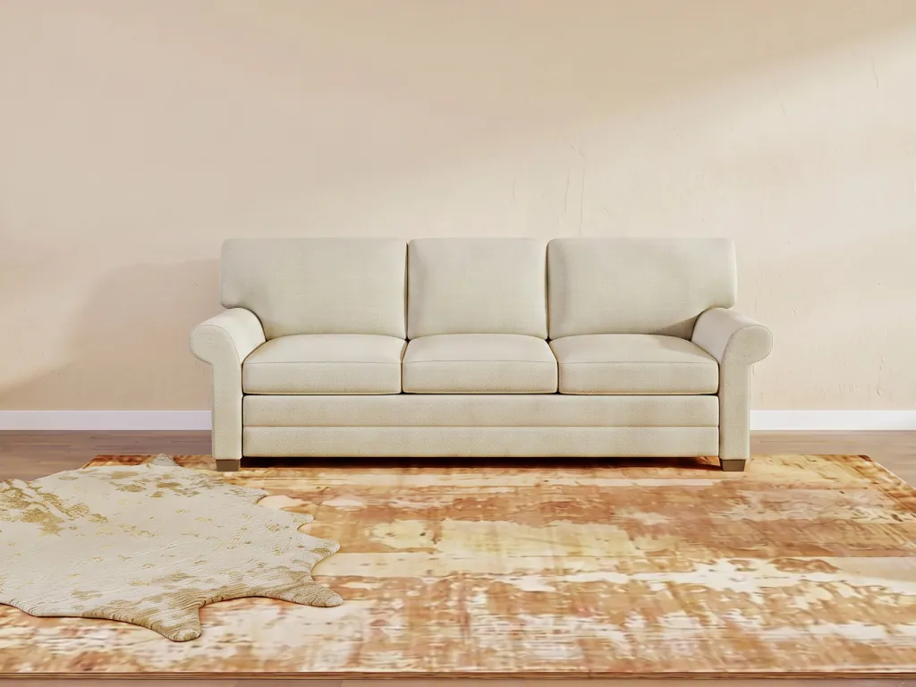 Sofa cleared of cushions, clutter, and wall art